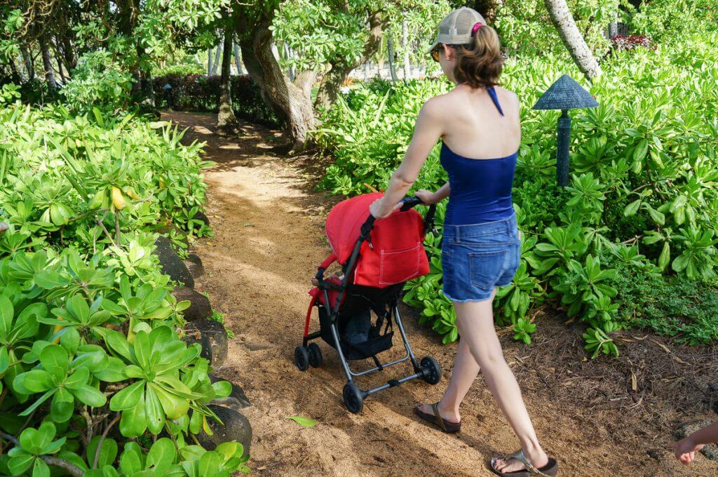 We took the travel stroller off-road to the beach on Kauai. Photo credit: Julie Wirtz