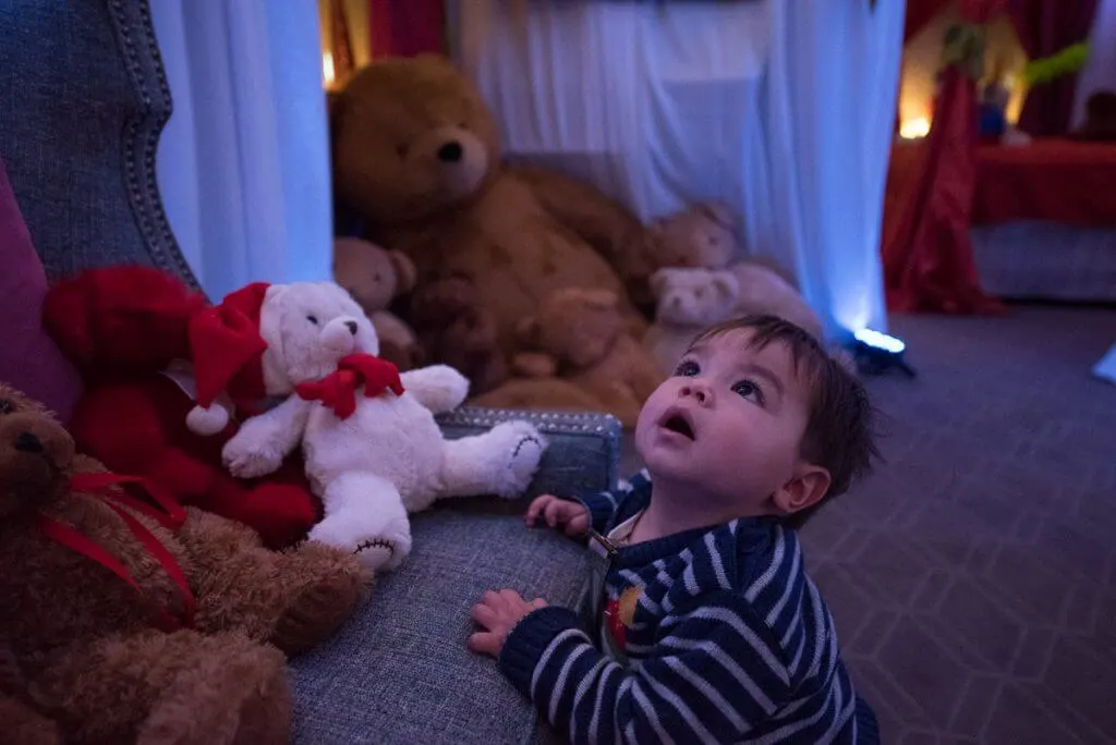 My 13-month-old was dazzled by the lights in Fairmont Olympic's Teddy Bear Suite. Photo credit: Darren Cheung