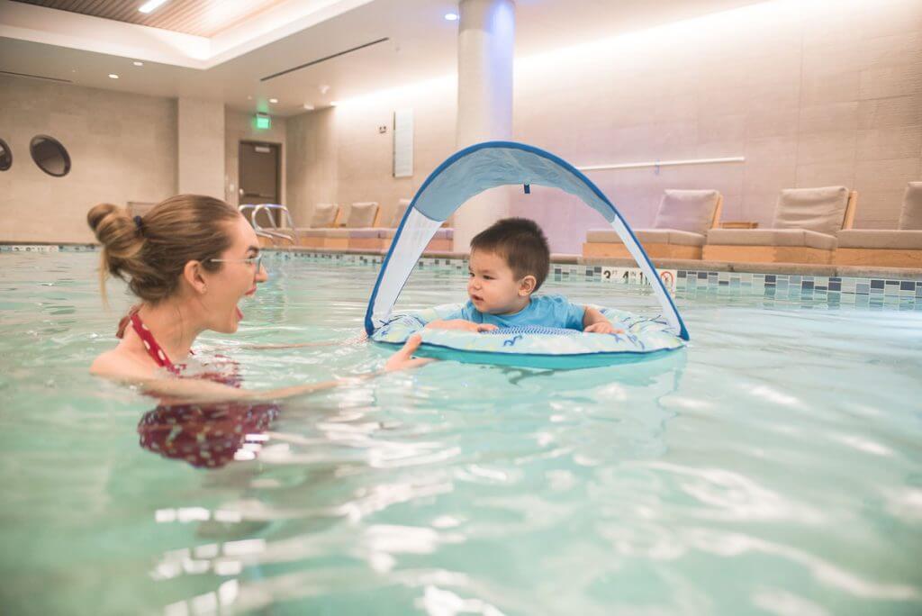 Photo of a baby pool float at the Hyatt Regency Lake Washington for a Seattle staycation #swimways #poolfloat #poolinflatable #swimmingpool