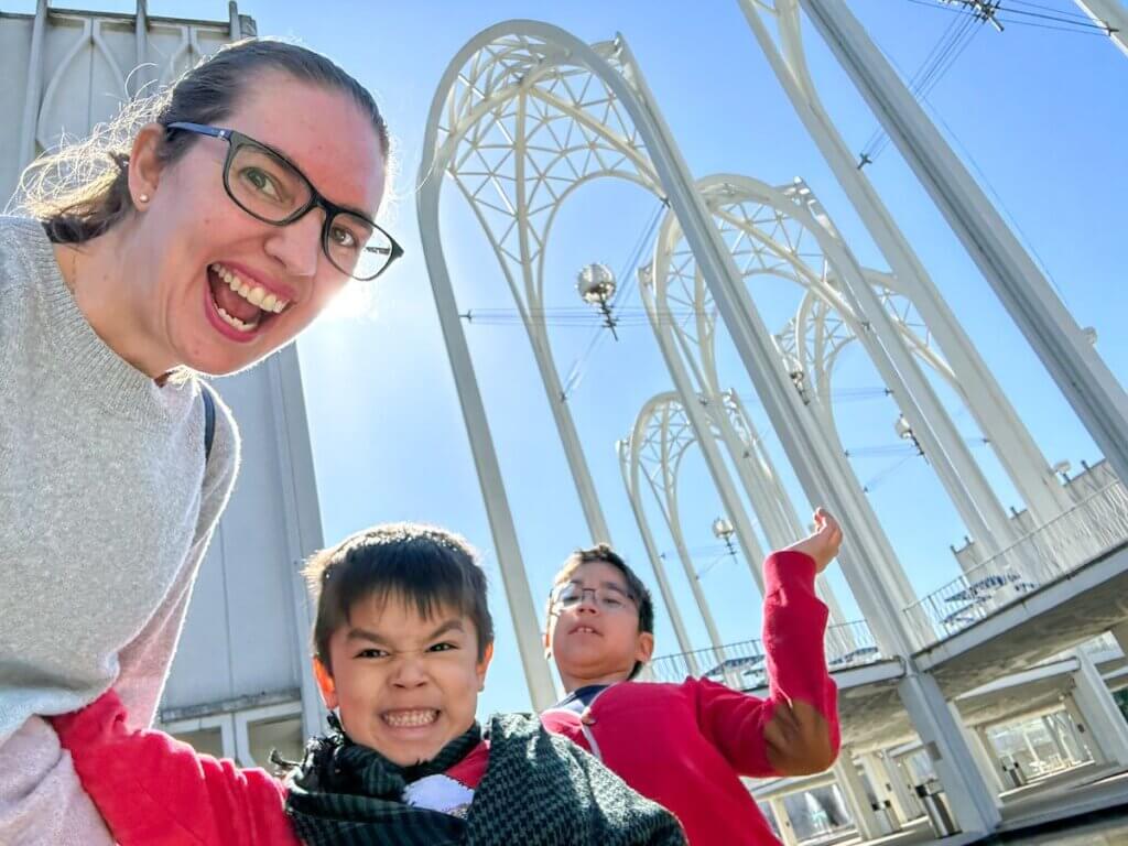 Image of a mom and two boys at the Pacific Science Center in Seattle