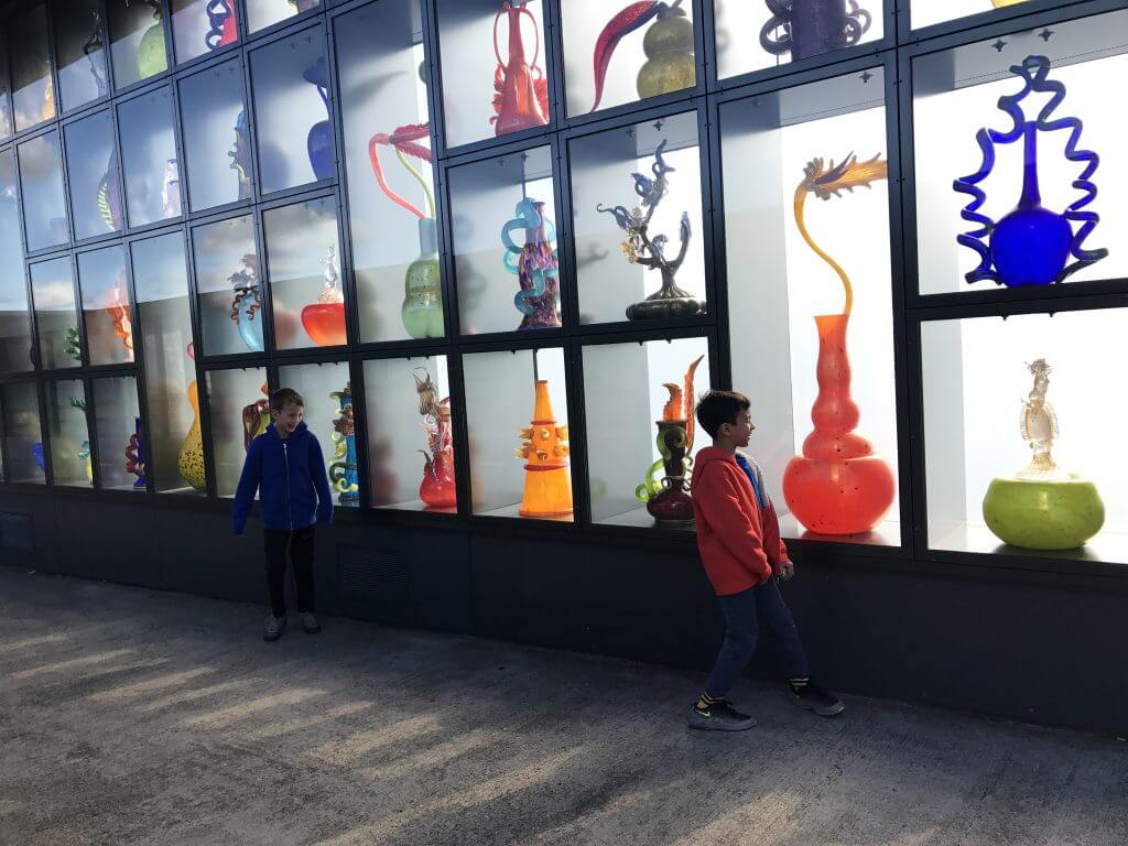 Photo of Chihuly glass in Tacoma, Washington, which is a fun thing to do in Tacoma, WA for family weekend getaways in Washington State #tacoma #tacomawa #pnw #chihuly #chihulyglass