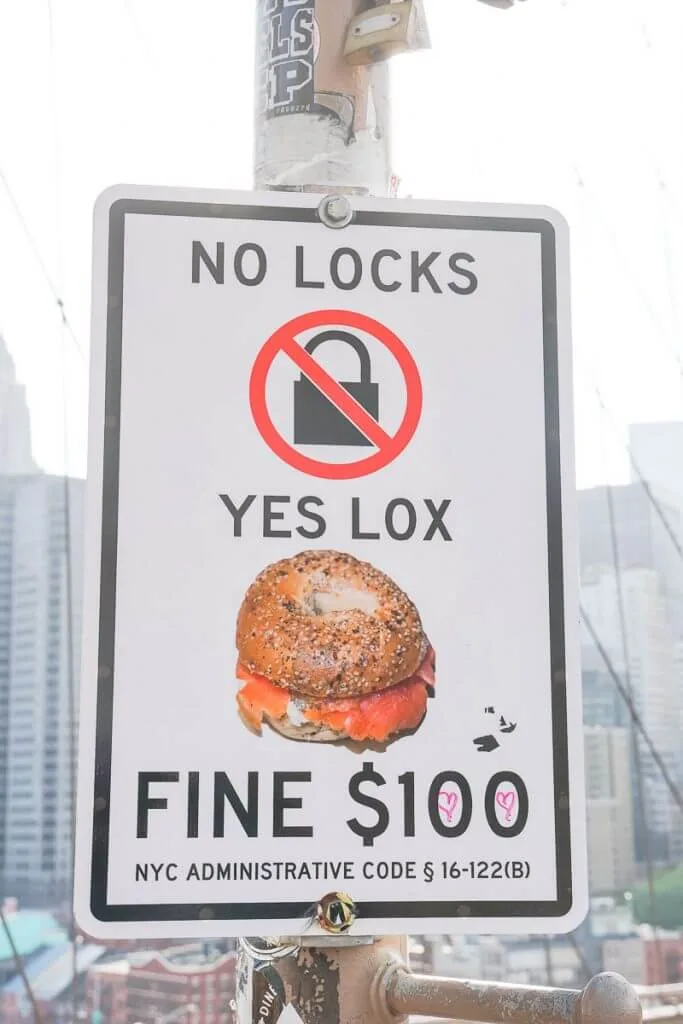 Photo of a sign on the Brooklyn Bridge banning "love locks" #lovelocks #brooklynbridge #nyc #nycsign #newyorkcity