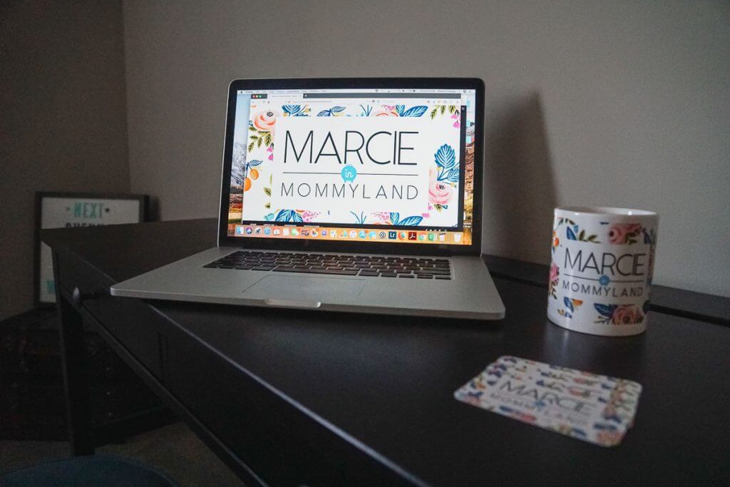 Photo of Marcie in Mommyland blog, custom mug, and business cards for bloggers #familytravelblog #travelblog #momblog #mommyblog