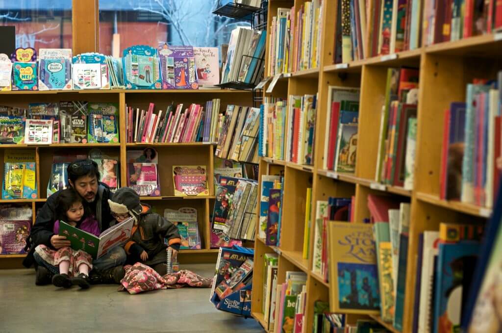 Photo of Powell's Used Books in Portland, Oregon which is the largest used bookstore and a must-see stop on a Pacific Northwest family vacation #powells #portland #portlandoregon #keepportlandweird #pnw #pacificnorthwest