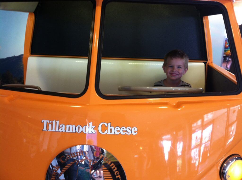 Photo of a boy at the Tillamook Cheese Factory on the Oregon Coast #tillamook #tillamookcheesefactory #oregoncoast #traveloregon