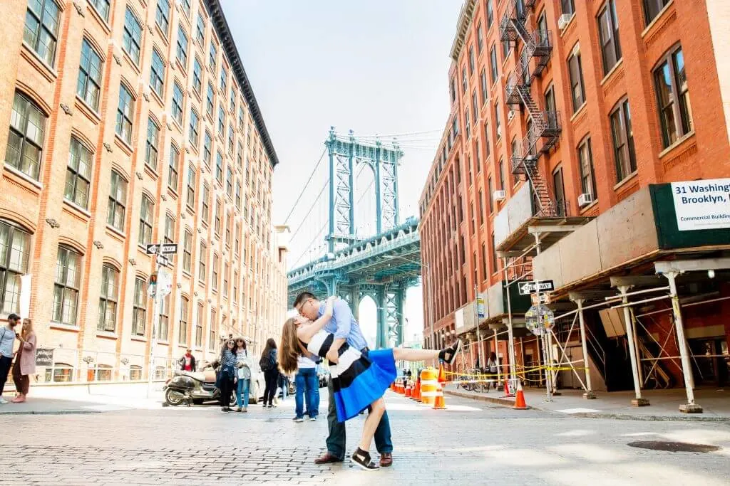 Photo in front of the Brooklyn Bridge at a popular NYC instagram spot in Brooklyn's DUMBO neighborhood and part of our 4-day New York City itinerary