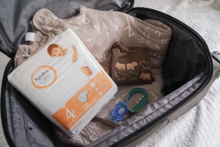 Memorable Family Travel Moments + Essentials for Traveling with a Baby #familytravel #flyingwithababy #flyingtips #travelwithababy #travelwithkids #diapers
