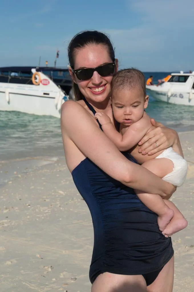Photo of a mom and baby on a beach near Phuket, Thailand #thailand #phuket #phiphi #familytravel #travelwithababy
