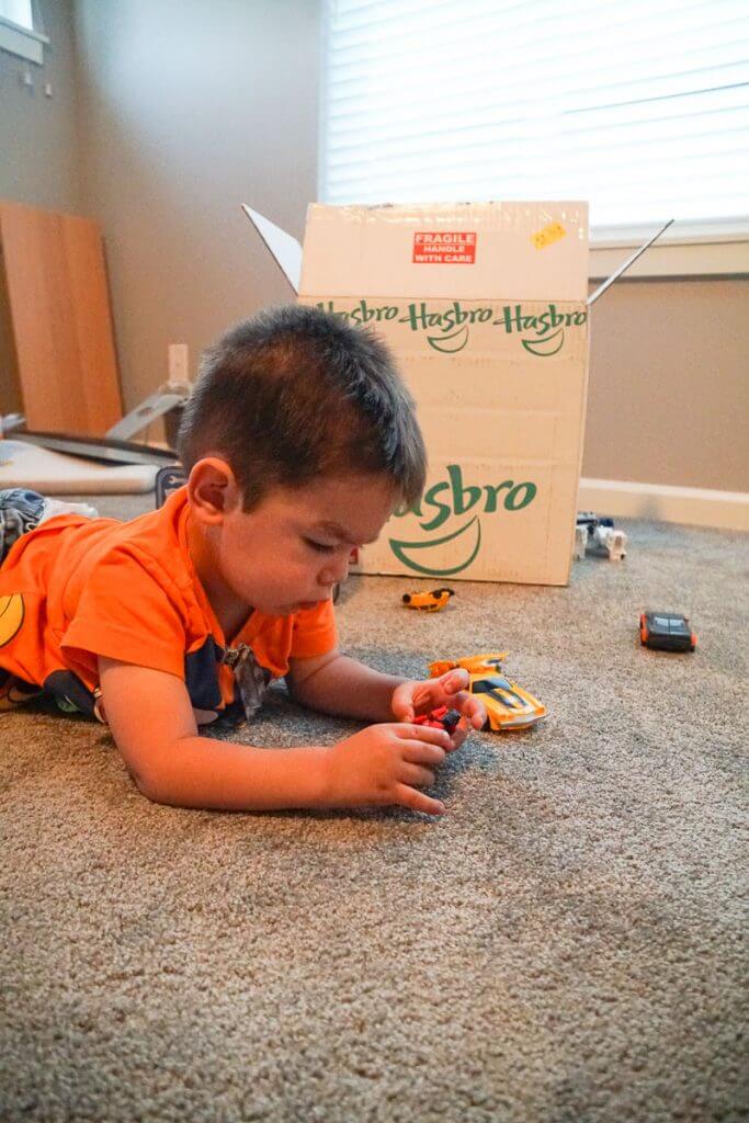 Photo of a toddler playing with Transformers from Hasbro #transformers #bumblebeemovie #hasbro