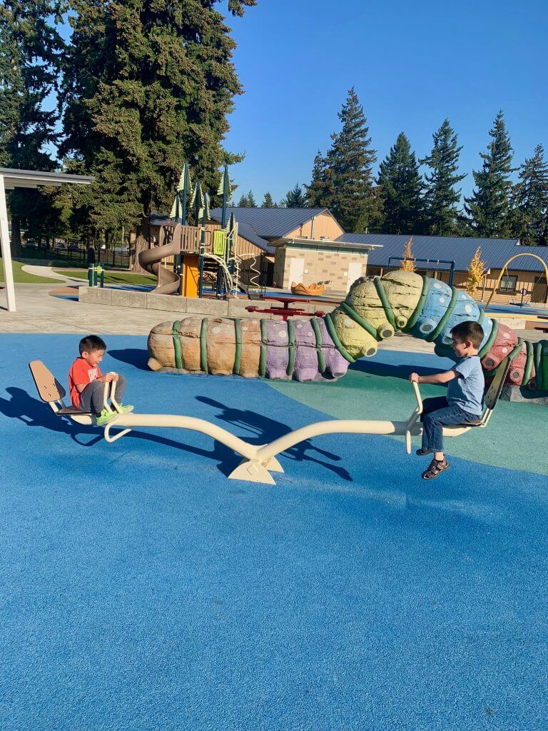 Photo of boys on a see saw at Meadow Crest Park in Renton, WA #seesaw #teetertotter #playground