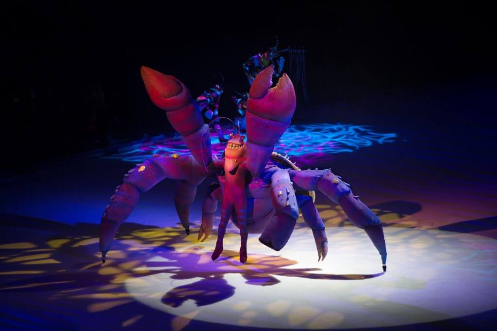 Photo of Tamatoa ice skating during the Moana section of Disney on Ice: Dare to Dream #DisneyOnIce #DareToDream