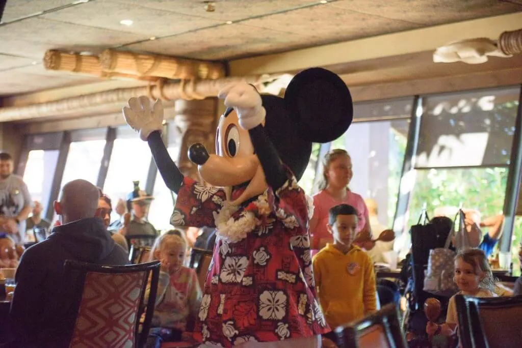 Photo of Mickey Mouse leading the parade at the Ohana character breakfast at Disney's Polynesian Village Resort #mickeymouse #ohana #ohanacharacterbreakfast #characterdining