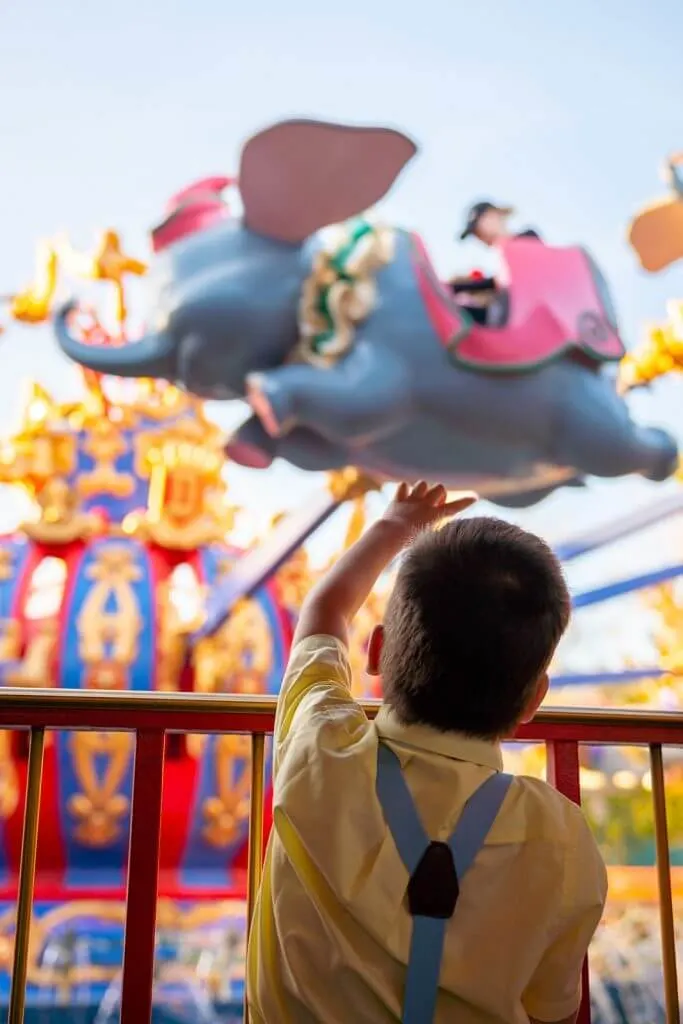 Dumbo the Flying Elephant is one of the most famous rides at Walt Disney World and is a top Walt Disney World photo spot for families with kids #dumbo #wdw #disneyworld #waltdisneyworld #DisneySMMC