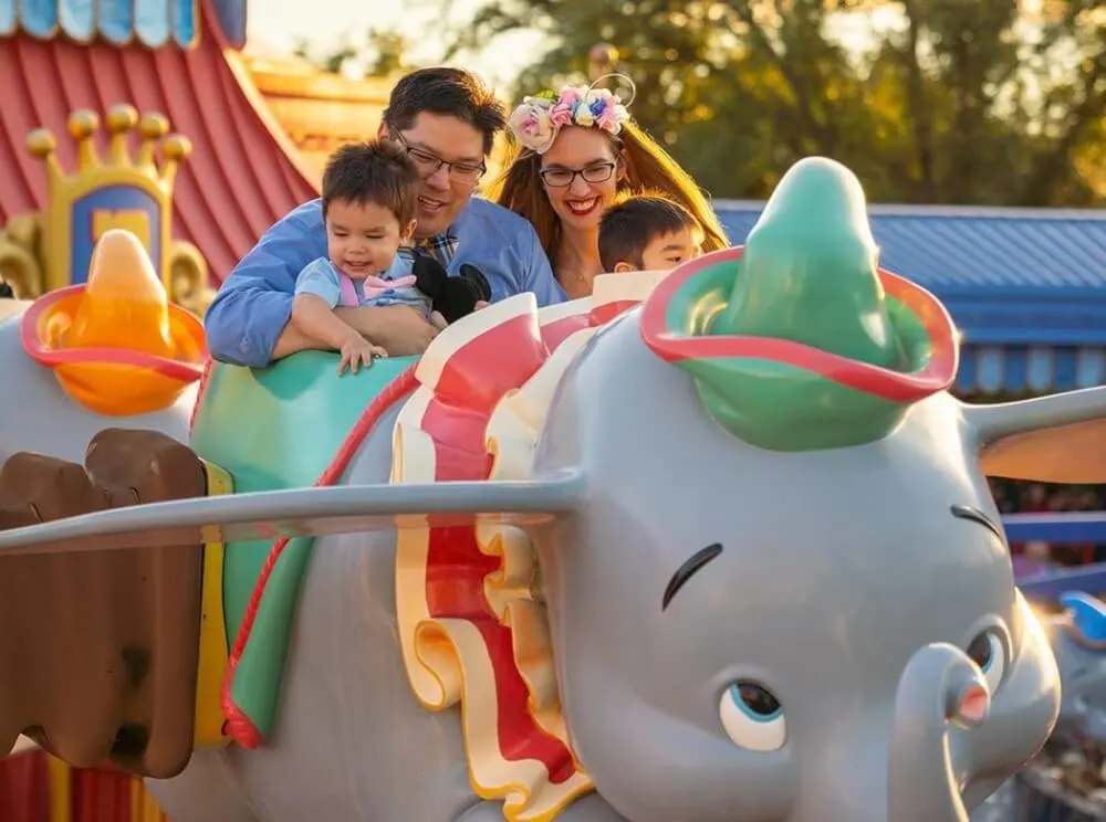 Family photo shoot in Dumbo, the flying elephant at Magic Kingdom Park at Walt Disney World