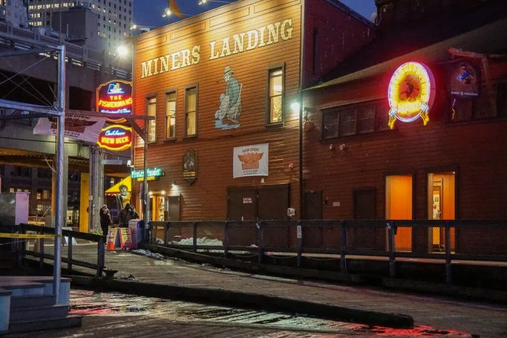 Miners Landing at Pier 57 in Seattle, WA features restaurants, shops, a carousel, and several top Seattle tourist attractions.