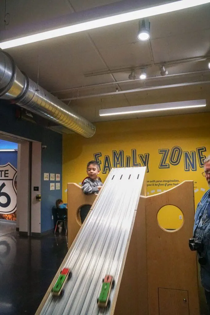 Kids will love hanging out in the Family Zone at America's Car Museum in Tacoma, WA where they can race pinewood cars and explore hands on exhibits for kids.