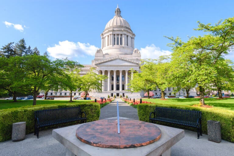 Visiting Olympia WA is an easy Seattle staycation for families | Recommendation for Visiting Olympia WA with kids featured by top US Seattle travel blogger, Marcie in Mommyland: image of the Olympia, WA capitol building.