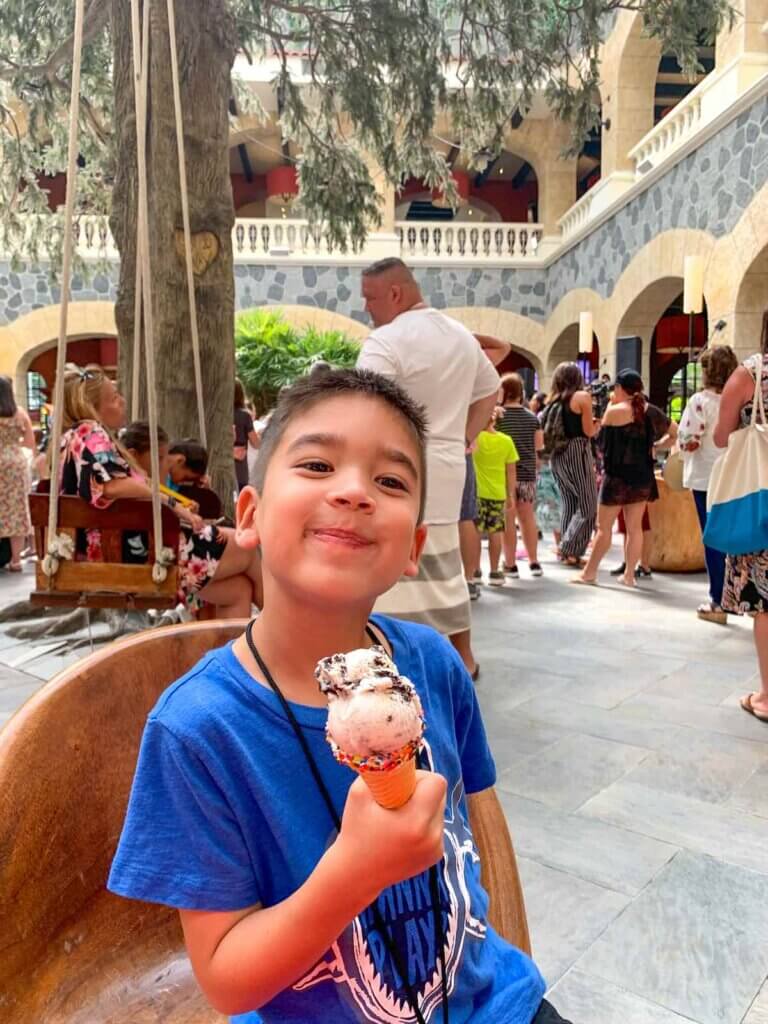 Image of a boy eating an ice cream cone at the Hard Rock Hotel Riviera Maya