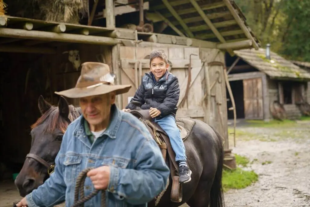 Pioneer Farm has lots of hands on experiences like horseback riding, blacksmithing, milking cows, feeding chickens and more. | mt rainier horseback riding