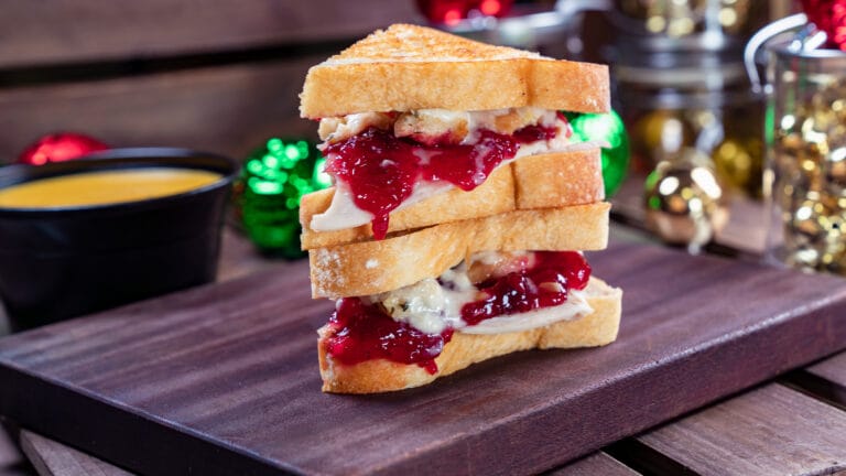 How to spend Disneyland at Thanksgiving featured by top US Disney blogger, Marcie and the Mouse: The Thanks-Mas Sandwich is part of the limited-time holiday foods at The Disneyland Resort. Available November 8 - January 6, the Thanks-Mas Sandwich features oven-roasted turkey, stuffing, gravy and cranberry sauce on rustic bread. This sandwich can be be purchased at Jolly Holiday Bakery in Disneyland Park. (Disneyland Resort)