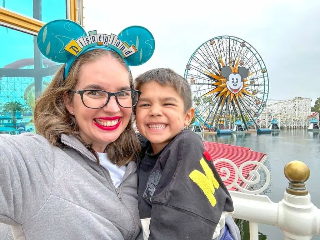 Image of a mom and boy on Pixar Pier at Disneyland