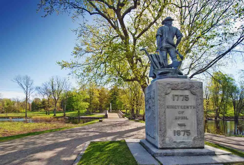 Top 7 Day Trips from Boston featured by top US travel blogger, Marcie in Mommyland: Minuteman Statue in Concord Massachusetts, which is a popular day trip from Boston