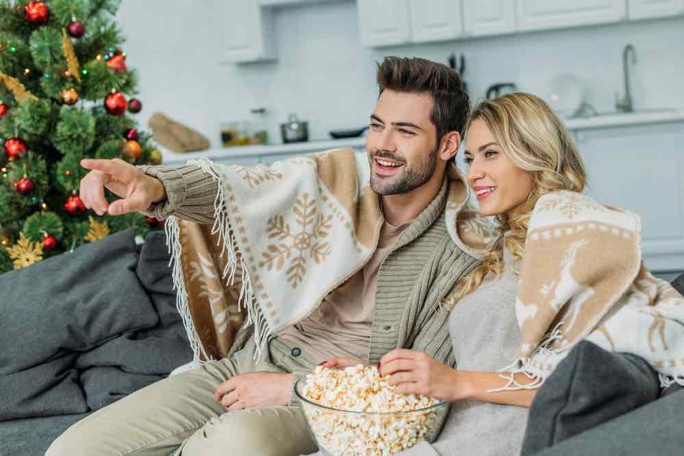 Watching Christmas movies is one of the free Christmas traditions that we all love!