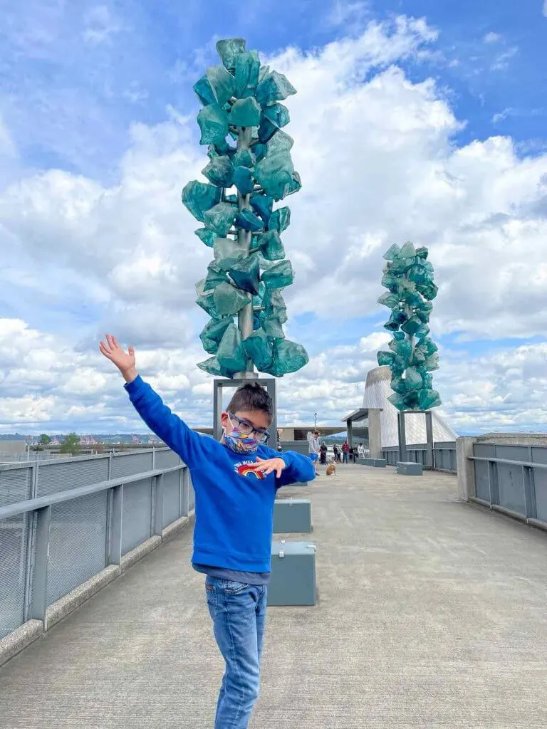 The Bridge of Glass is a top Tacoma attraction. Image of a boy dabbing on the Bridge of Glass.