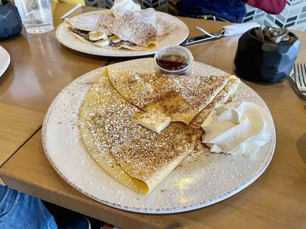 One of the best places to eat in Sumner is Craft 19. Image of two plates of sweet crepes.
