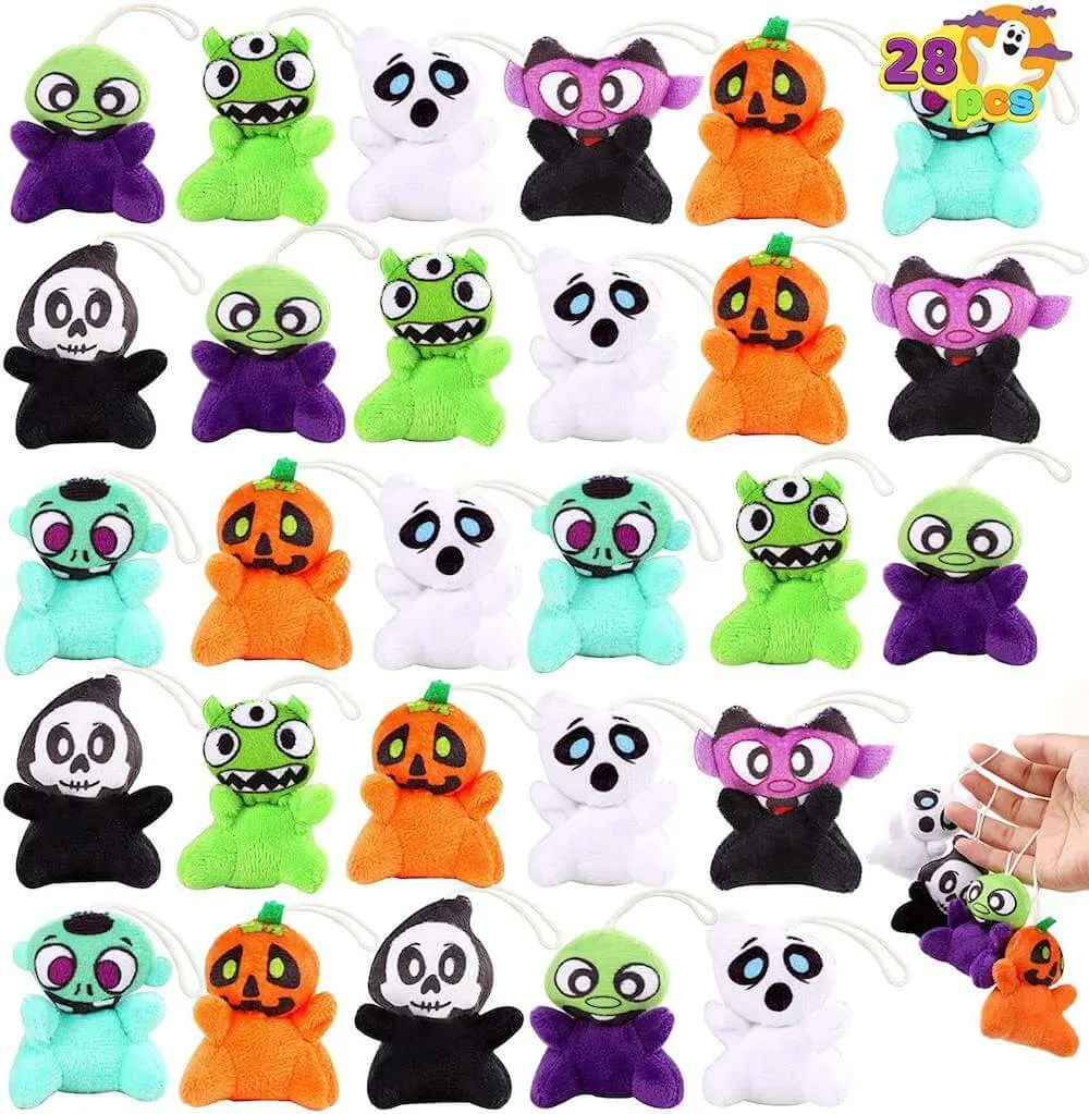 These mini Halloween plush toys are some cute Halloween candy alternatives to give trick-or-treaters this year. Image of Halloween plushies like pumpkins, ghosts, aliens, and more.