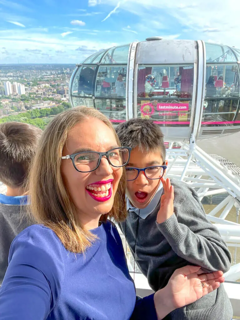 Image of a mom and boy taking a selfie on top of the London Eye