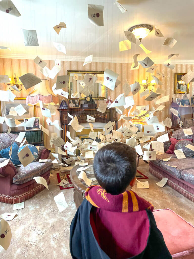 10 Magical Harry Potter Destinations Every Fan Should Visit: Image of a boy dressed as a wizard at the WB Studio in London.