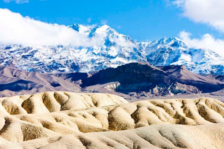 Find out the best national parks to visit in winter recommended by top family travel blog Marcie in Mommyland. Image of