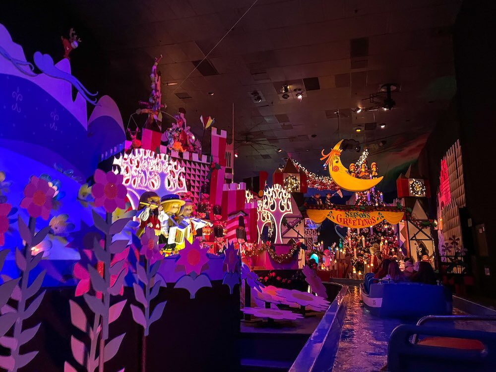 Image of the interior of the "it's a smal world" ride at Disneyland during Christmas
