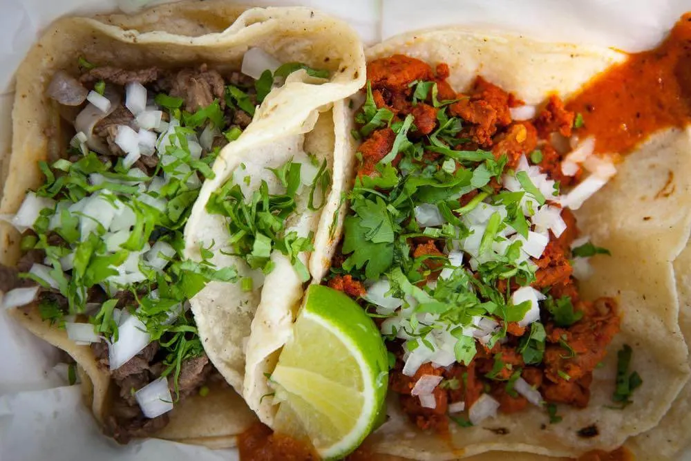 Going on a taco tour is a kid-friendly thing to do in Cabo San Lucas, Mexico. Image of Beef and chorizo tacos