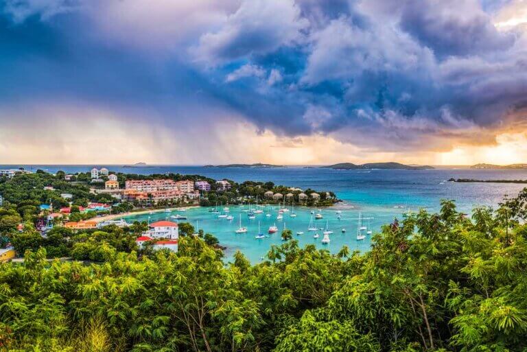 Find out the best warm winter destinations in the U.S. recommended by top family travel blog Marcie in Mommyland. Image of Cruz Bay, St. John, United States Virgin Islands.