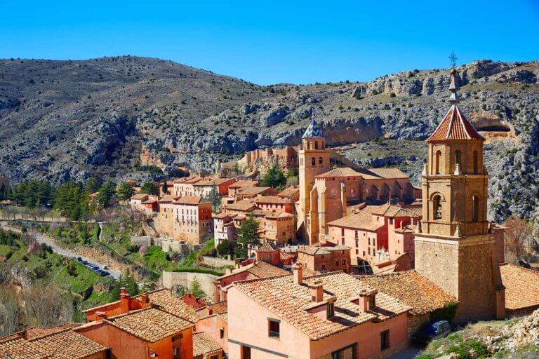 Find out the best hidden gems in Spain worth seeing according to top family travel blog Marcie in Mommyland. Image of Albarracin medieval town village at Teruel Spain
