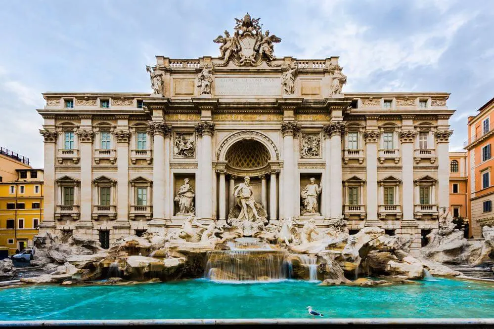 The Trevi Fountain in Rome, Italy with pigeon