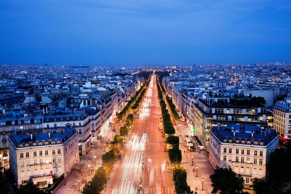 View on Avenue des Champs-Elysees from Arc de Triomphe at night Paris, France