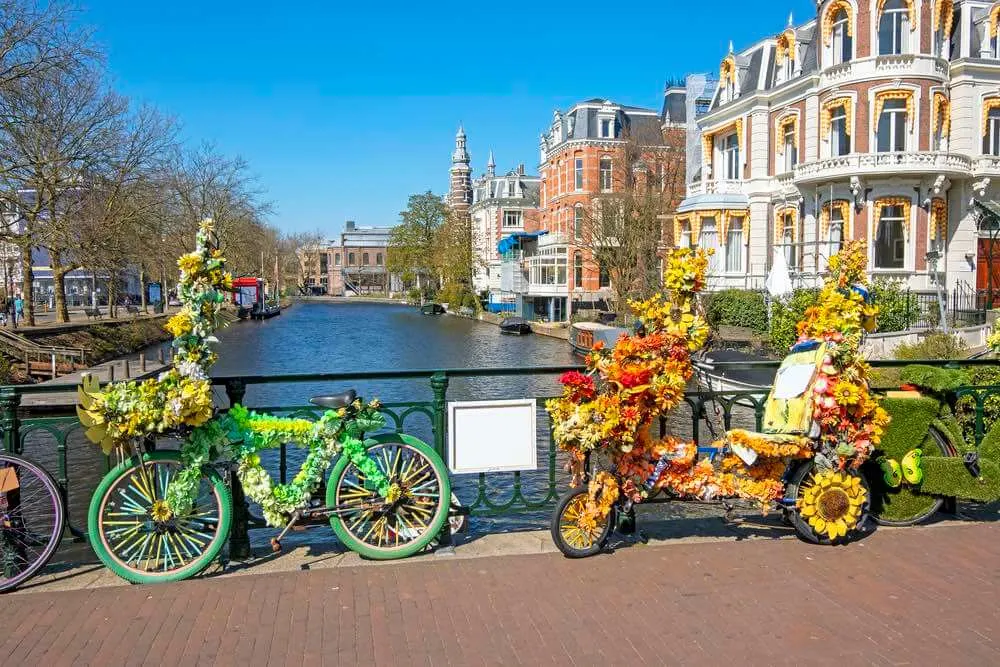 Bikes decorated with flowers in Amsterdam the Netherlands in spring