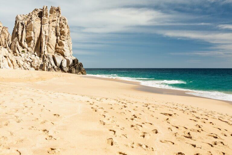 Find out the best Cabo San Lucas travel tips by top family travel blog Marcie in Mommyland. Image of Cabo San Lucas beach, Mexico
