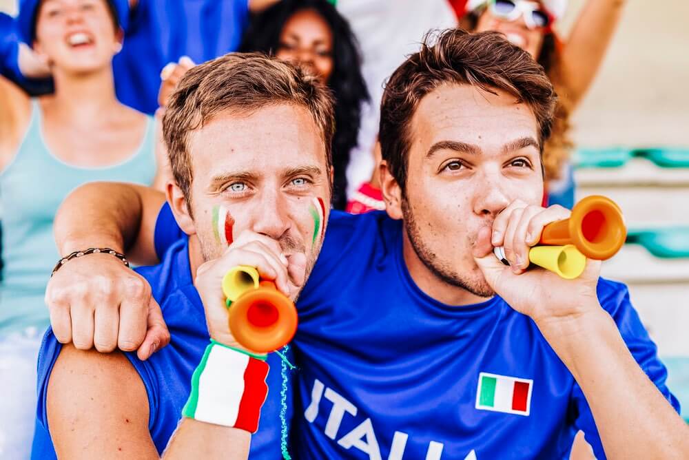 Supporters from Italy at stadium watching the match