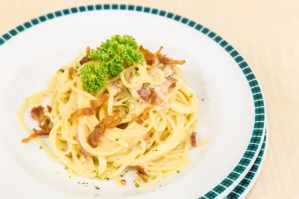 spaghetti carbonara with bacon, italian groumet cuisine