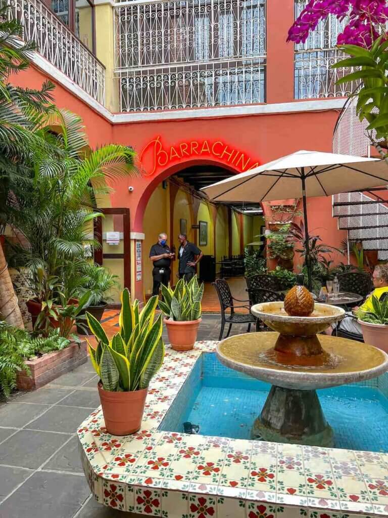 Image of a fountain and colorful restaurant in Old San Juan Puerto Rico.