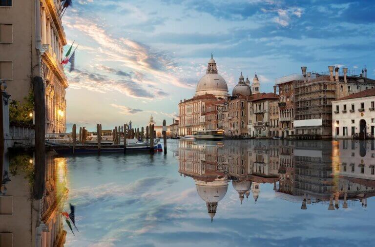 Find out what is Italy known for. Image of a canal in Venice