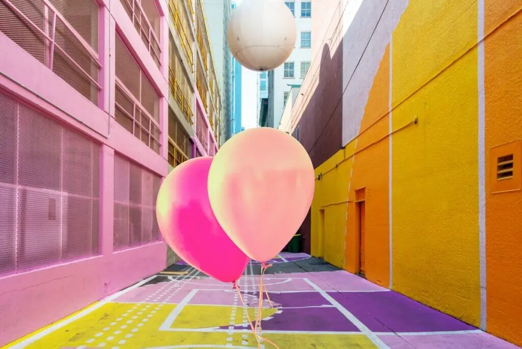 Pink balloons in Alley Oop, a colorful alley in Vancouver BC, Canada