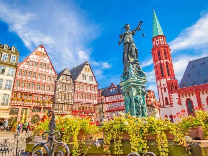 Check out the best Germany travel tips by top travel blog Marcie in Mommyland. Image of Frankfurt, Germany Old Town skyline.