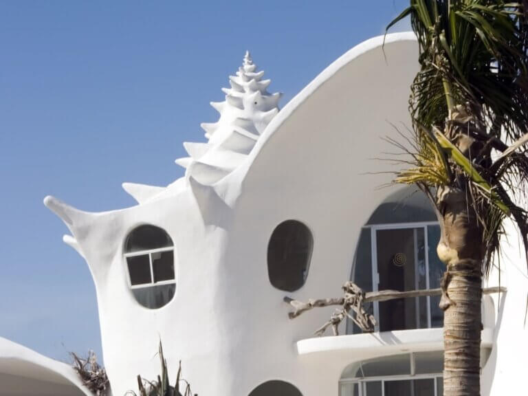 Check out these quirky hotels in Mexico recommended by top family travel blog Marcie in Mommyland. Image of the Shell House in Isla Mujeres