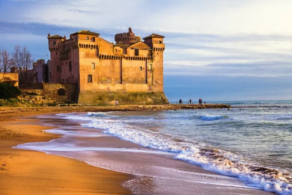 Image of a castle over the sea at sunset in Santa Marinella, Italy