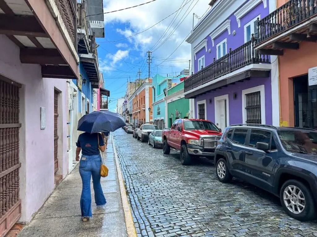 Image of a woman holding an umbrella in Old San Juan Puerto Rico